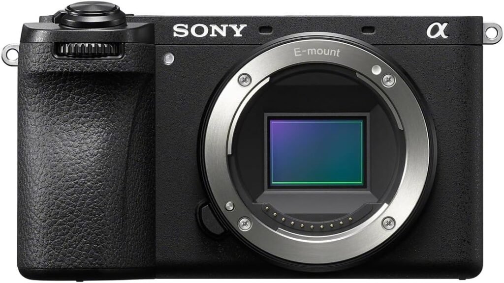 Front view of the Sony Alpha 6700 mirrorless camera with a 16-50mm kit lens, showcasing its compact design, textured grip, and intuitive button layout. Ideal for beginner photographers and vloggers, the camera is lightweight and packed with advanced features like a 26.0 MP APS-C sensor and 4K video capabilities.